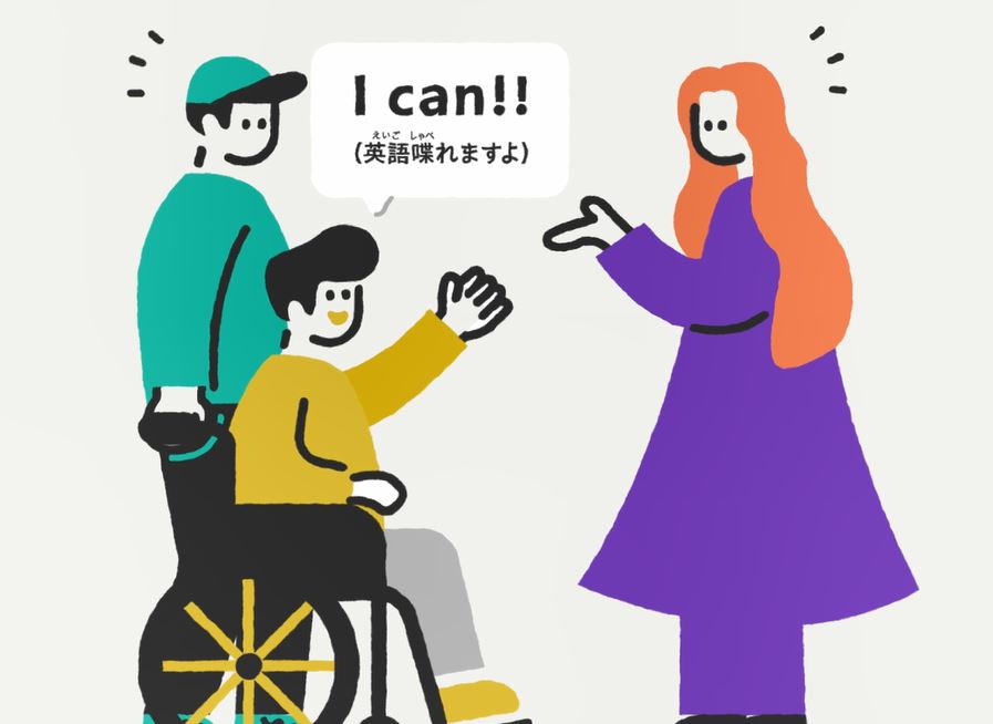 車椅子の男性が英語で答える