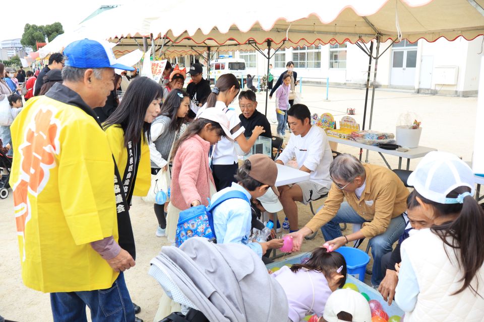 挨拶する鶴田校区自治協議会會田会長