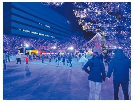 イルミネーション点灯時の屋外スケートリンクの写真