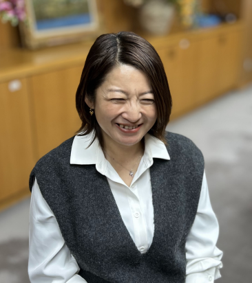 笑顔の佐々木久美子さん